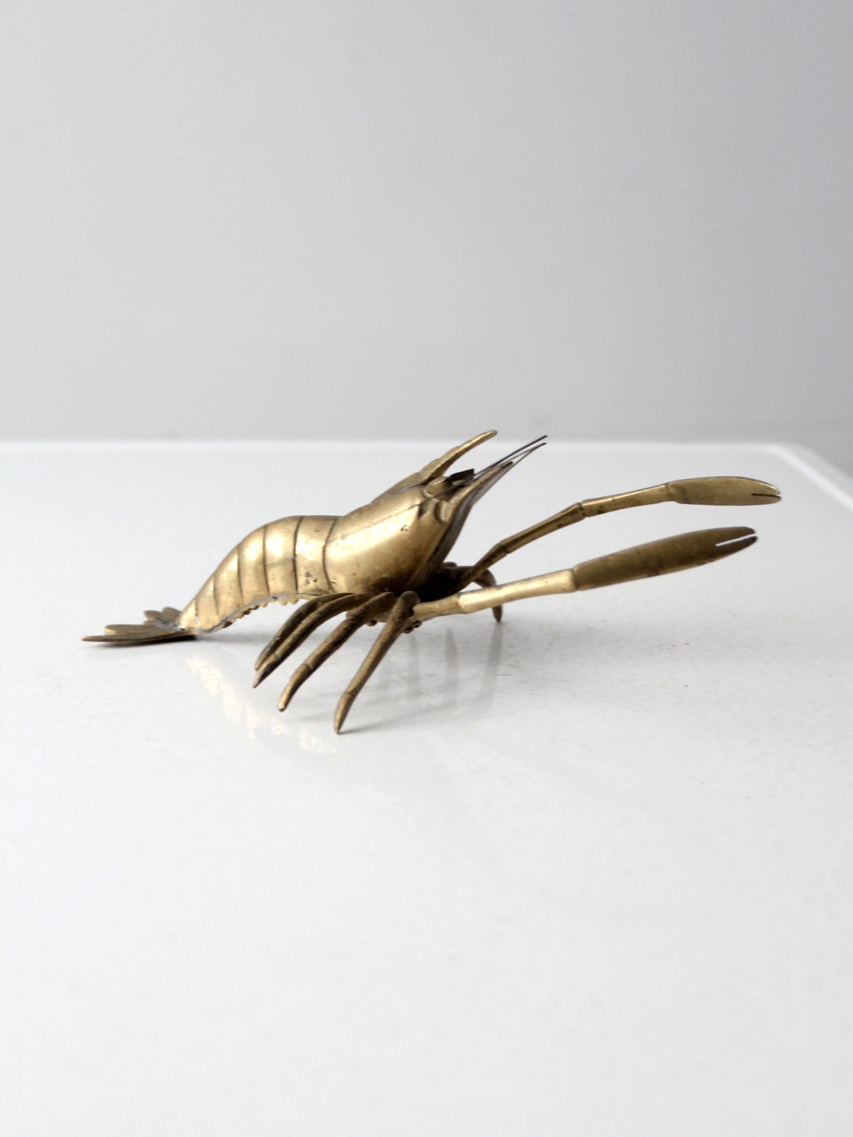 mid-century brass lobster