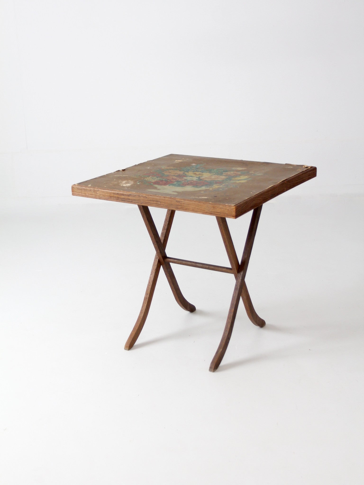vintage wood folding table with floral top