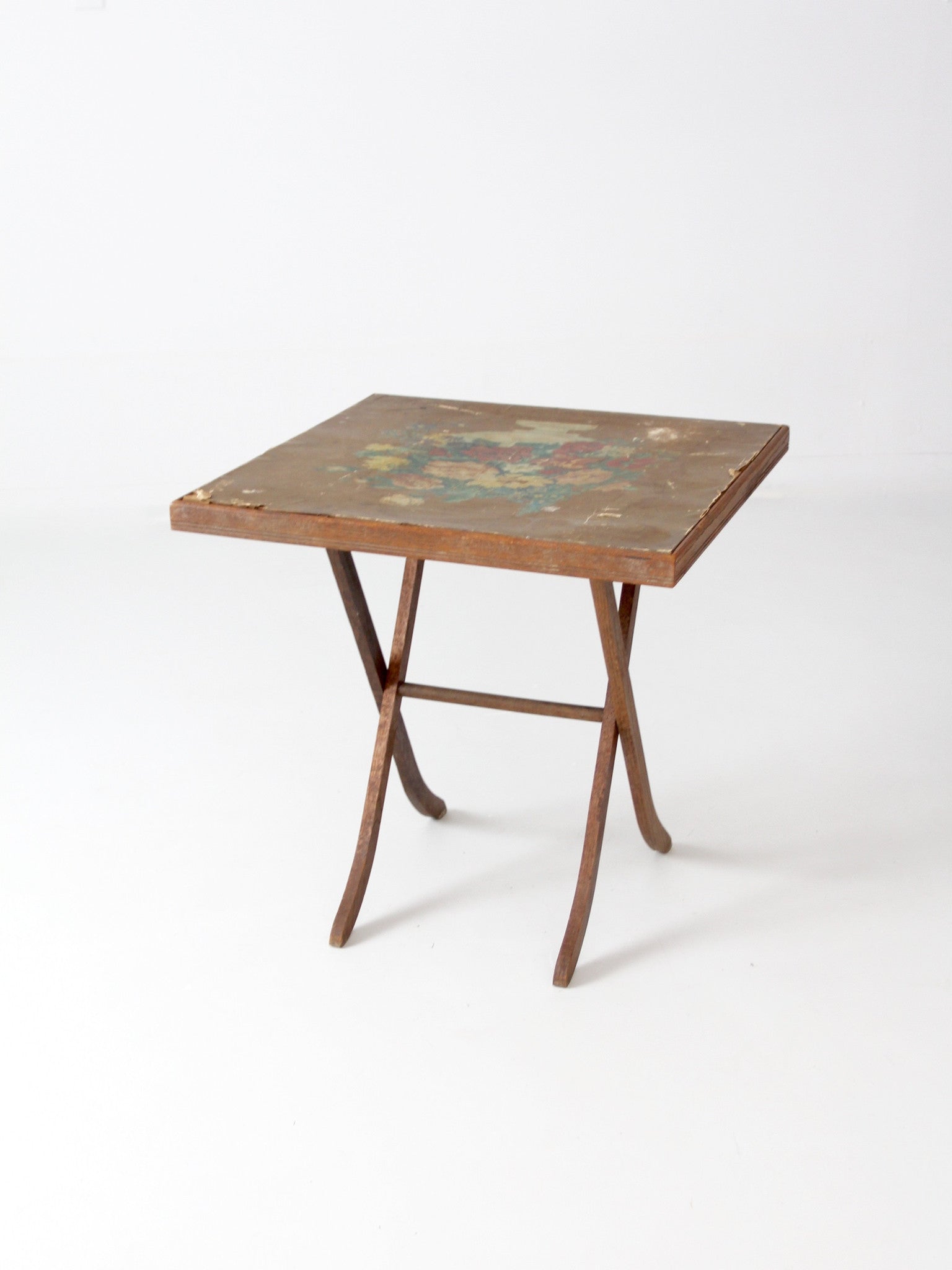 vintage wood folding table with floral top