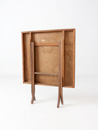 vintage wood folding table with floral top