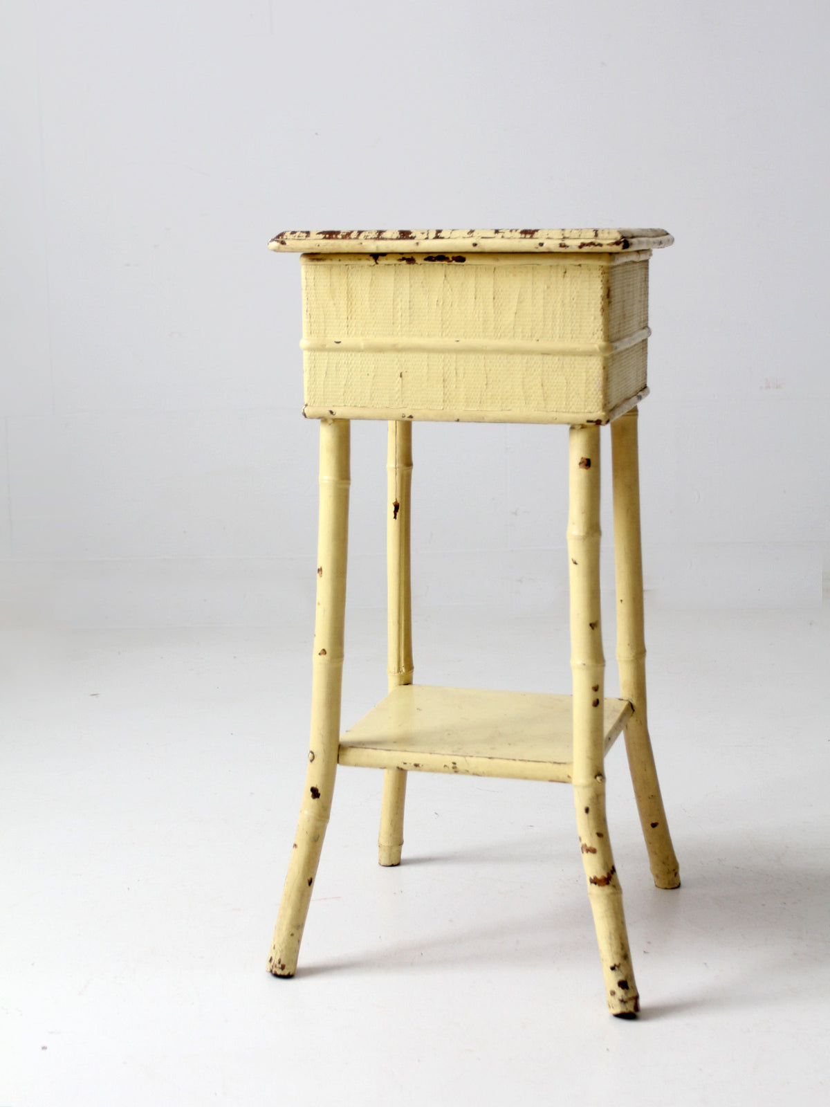 antique bamboo side table with storage top