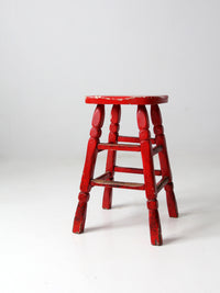 vintage red wooden stool