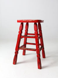 vintage red wooden stool