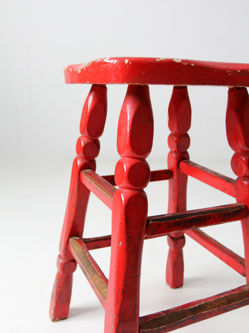 vintage red wooden stool