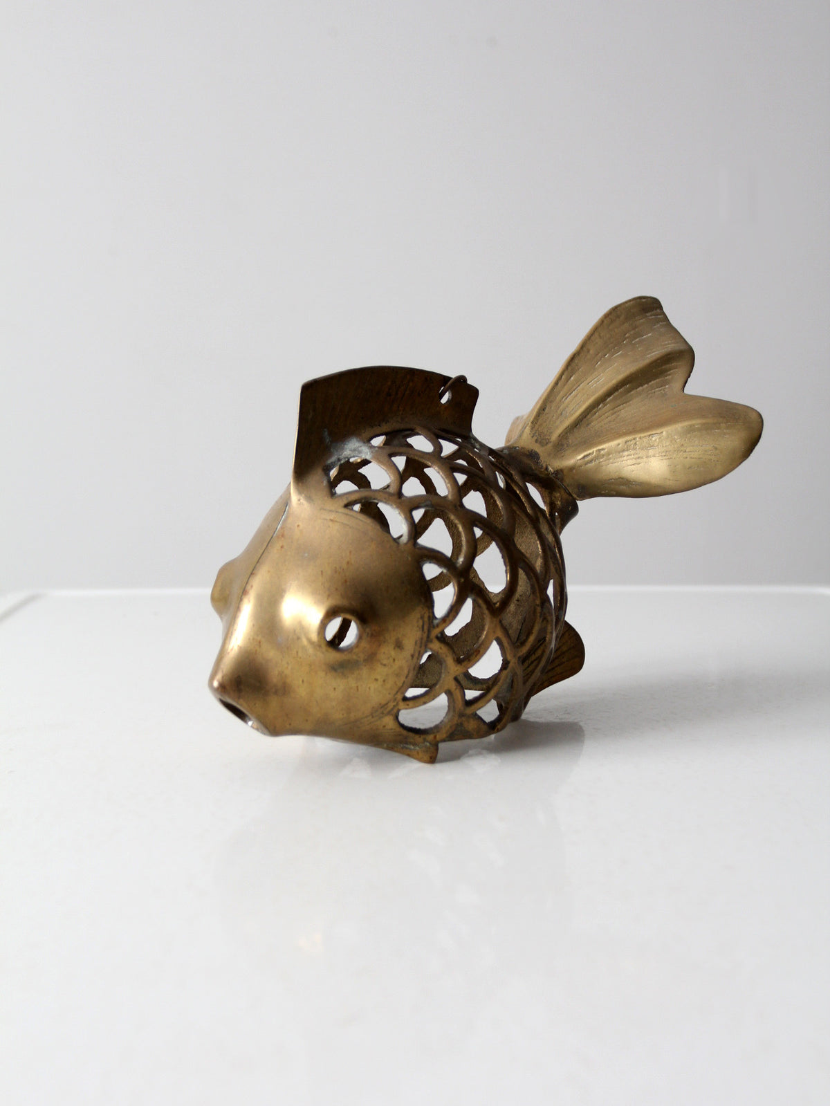 mid-century brass fish