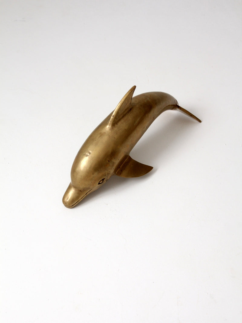 mid-century brass dolphin