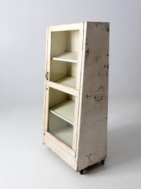 vintage medical cabinet