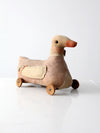 antique toy duck on wheels