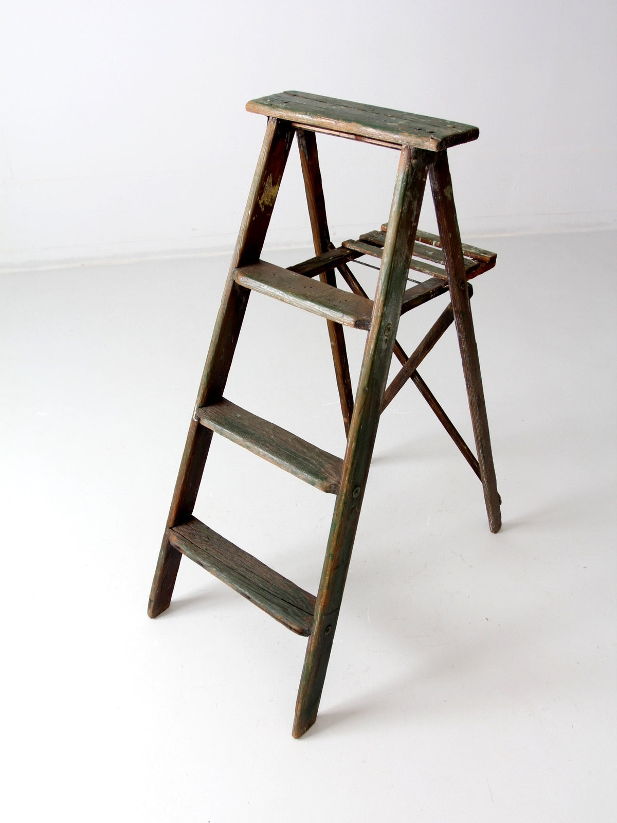 vintage green wood ladder