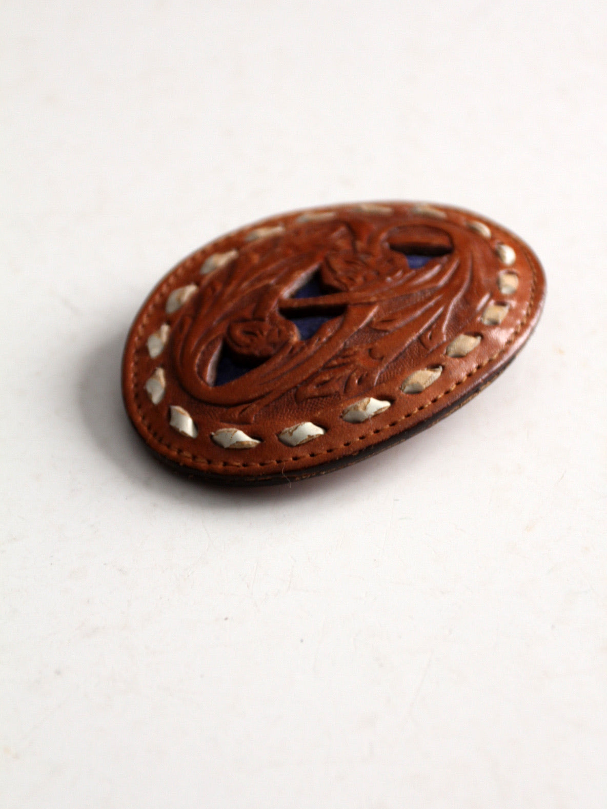 vintage tooled leather buckle