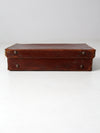 antique leather suitcase with travel stickers