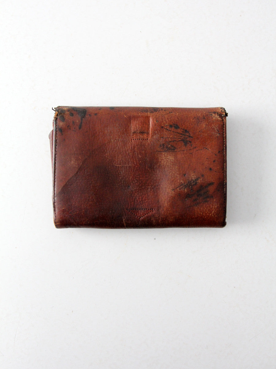 antique leather clutch with art nouveau tooling