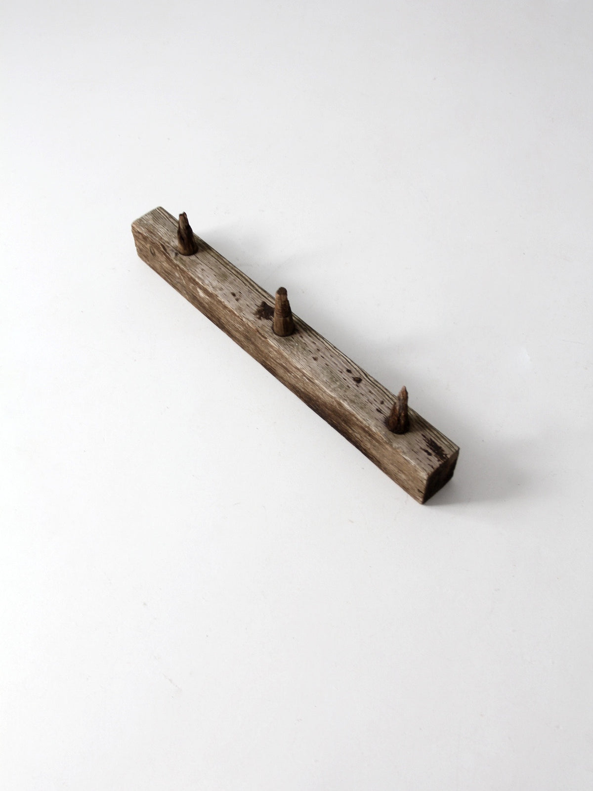 antique wooden peg post