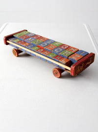 vintage Halsam toy cart with wooden blocks