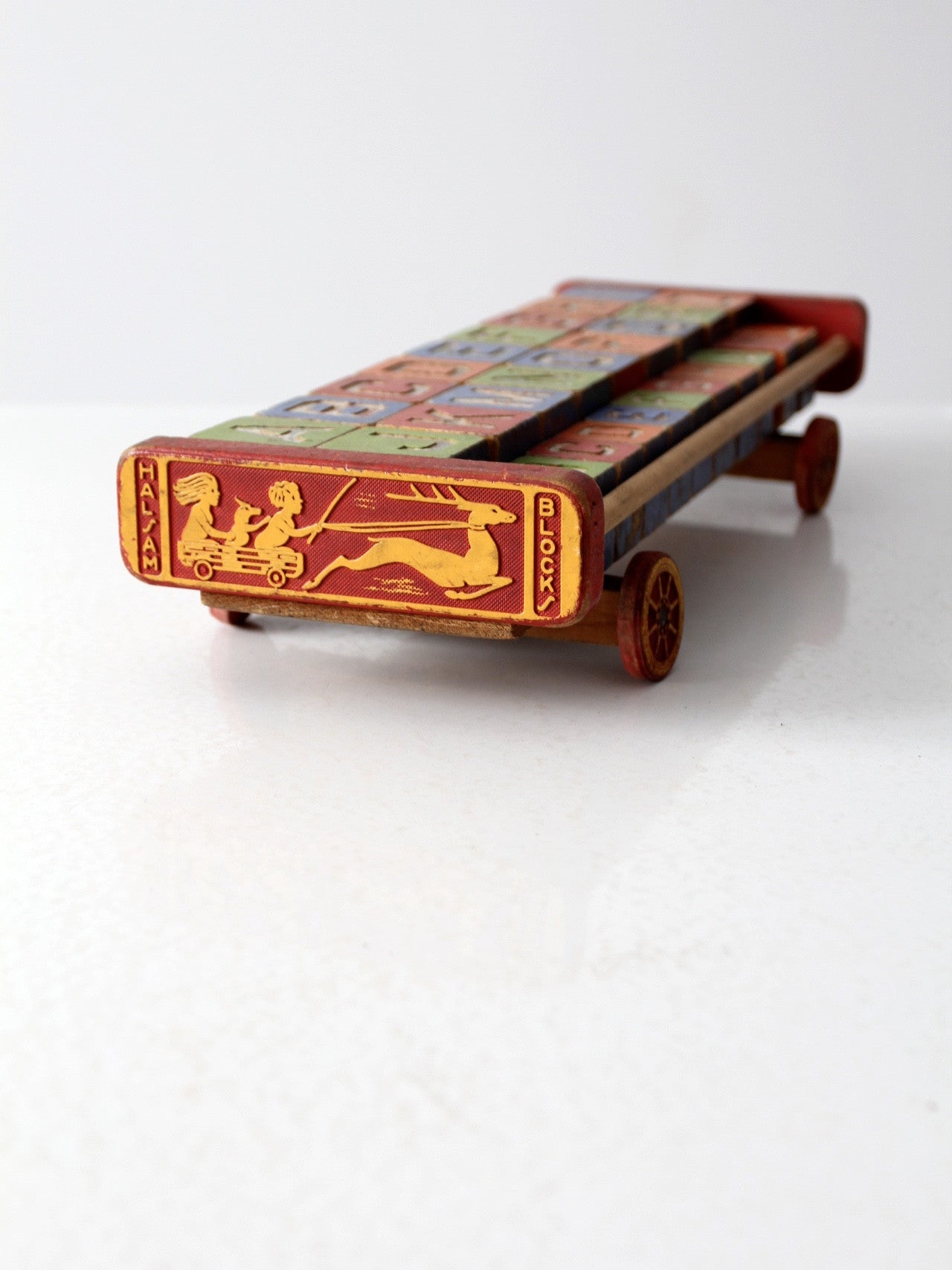 vintage Halsam toy cart with wooden blocks