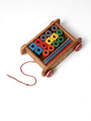 vintage Playskool wagon with wooden toy blocks