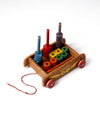 vintage Playskool wagon with wooden toy blocks