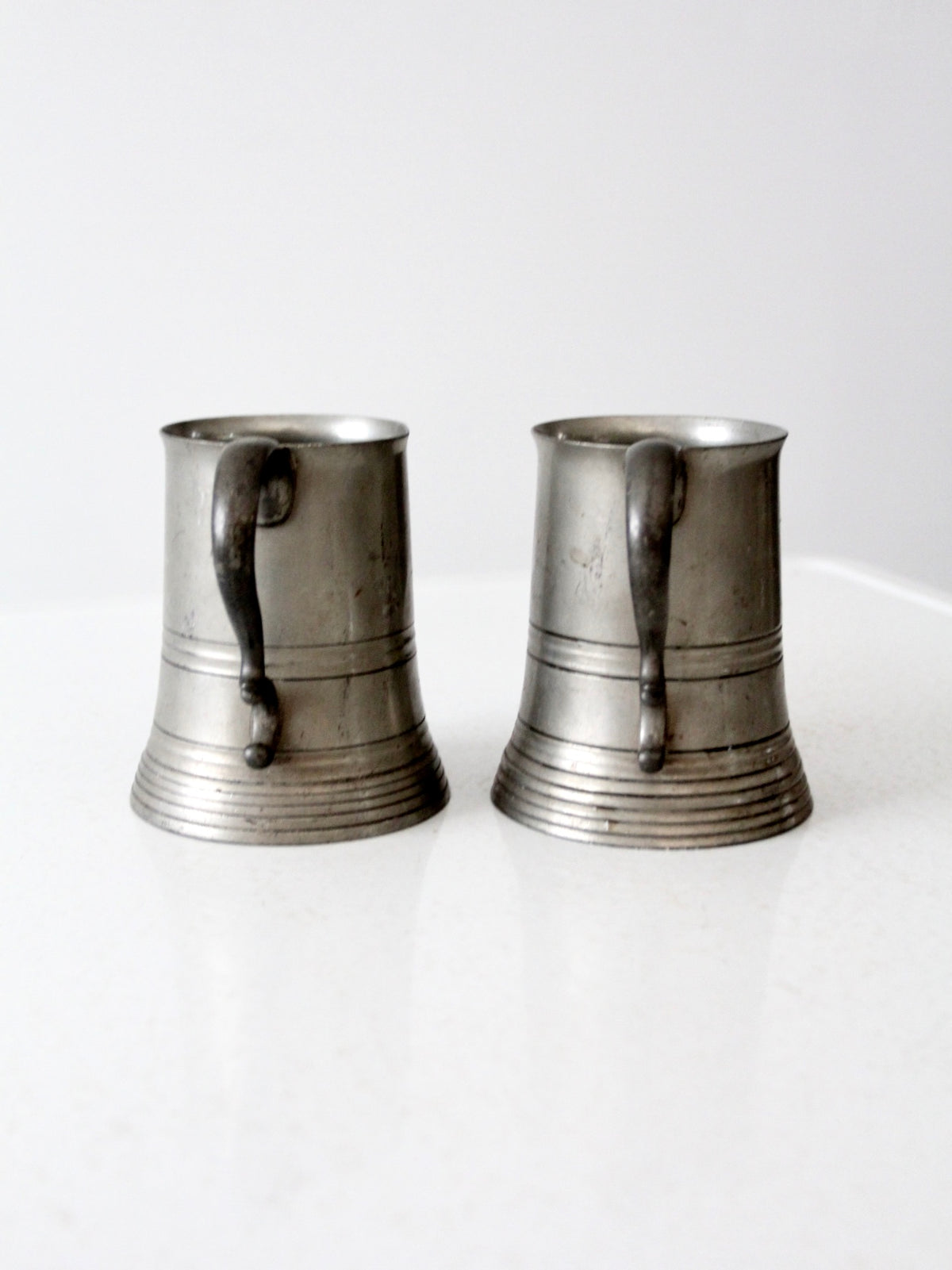 antique glass bottom pewter mugs