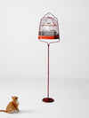 antique bird cage with cast iron stand
