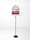 antique bird cage with cast iron stand