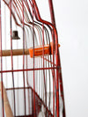antique bird cage with cast iron stand