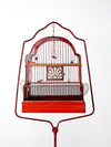 antique bird cage with cast iron stand