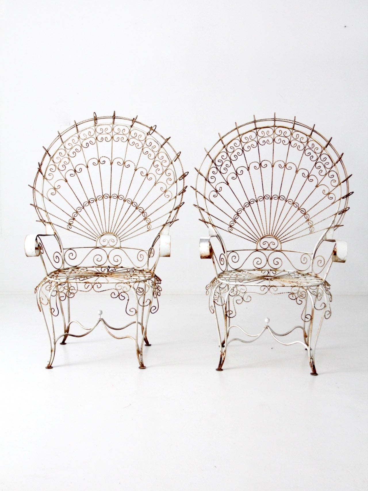 wrought iron peacock chairs