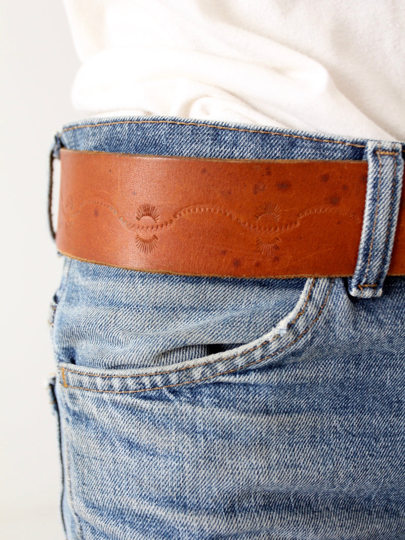 vintage 70s tooled leather belt with zodiac buckle