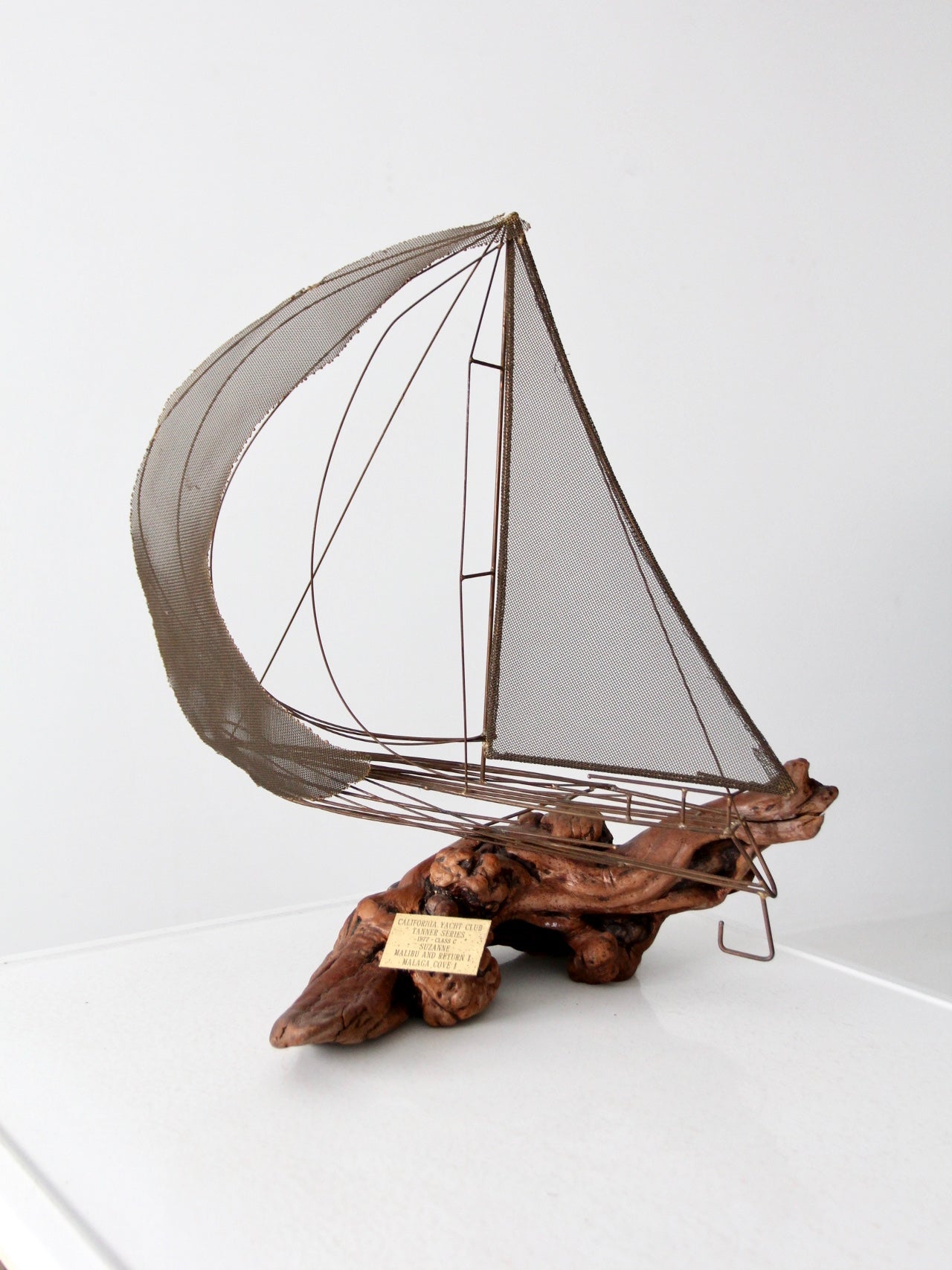 vintage brass and driftwood boat sculpture
