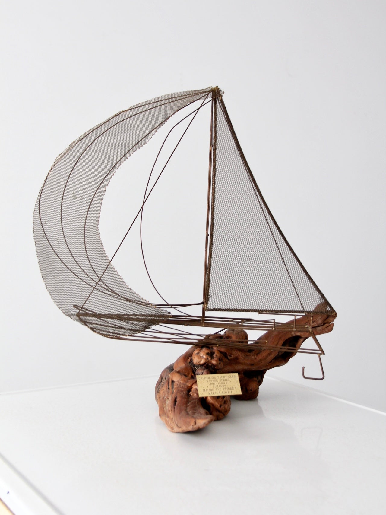 vintage brass and driftwood boat sculpture