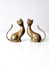 mid-century brass cats - a pair