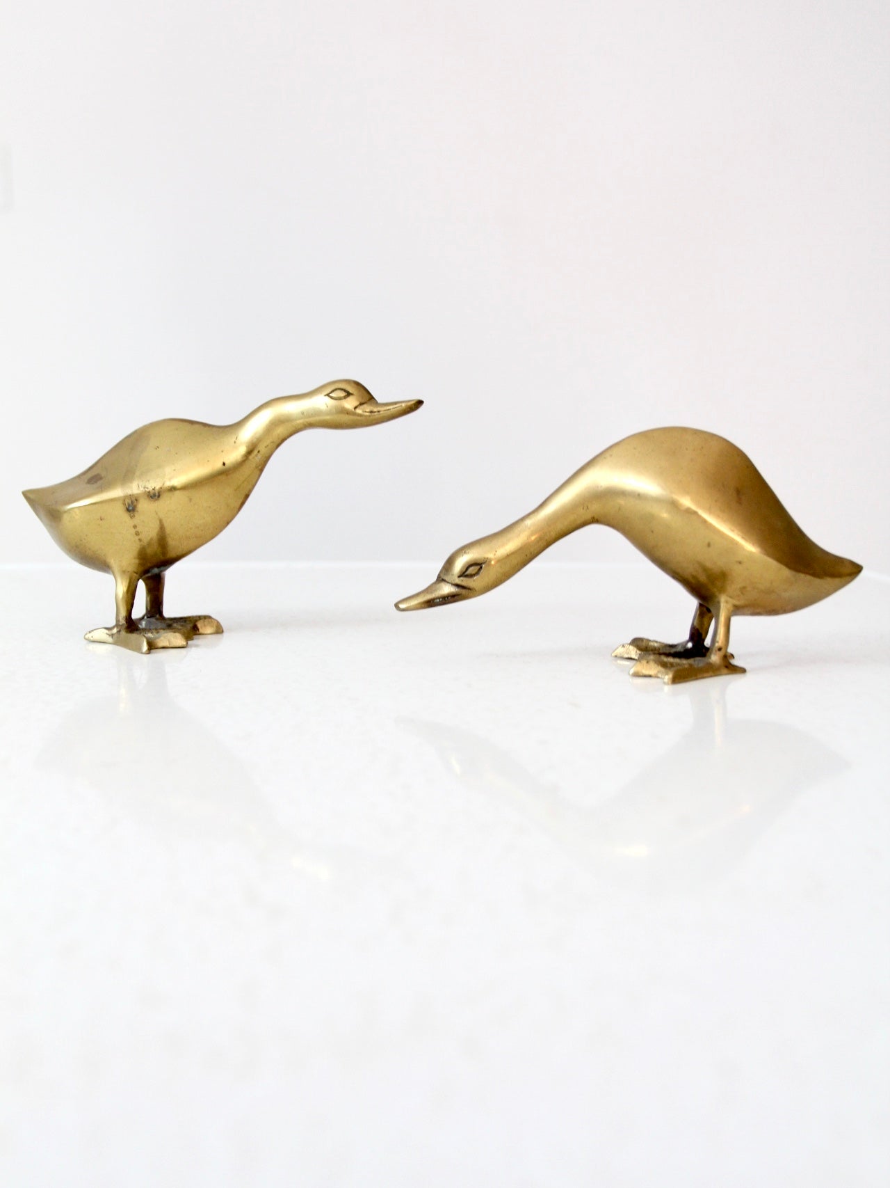 mid-century brass geese pair