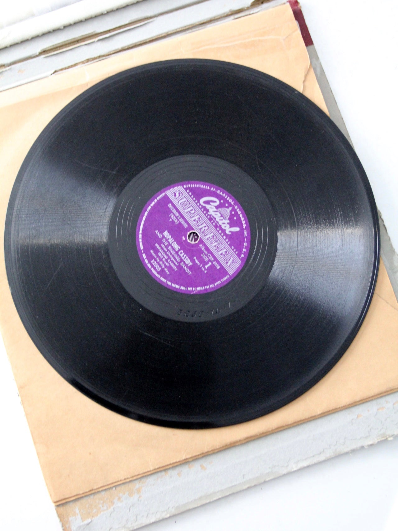 1950s Hoplalong Cassidy boots and record book