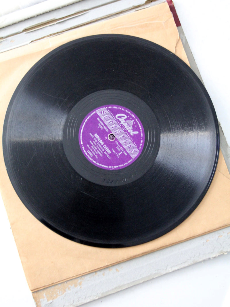 1950s Hoplalong Cassidy boots and record book