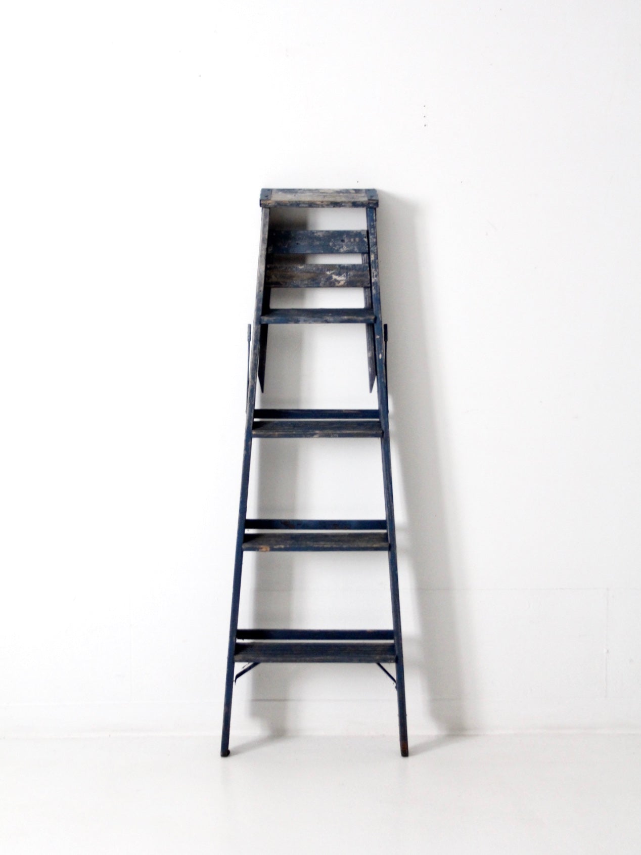 vintage blue wooden ladder