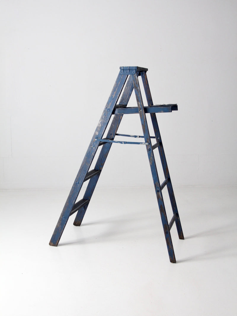 vintage blue wooden ladder