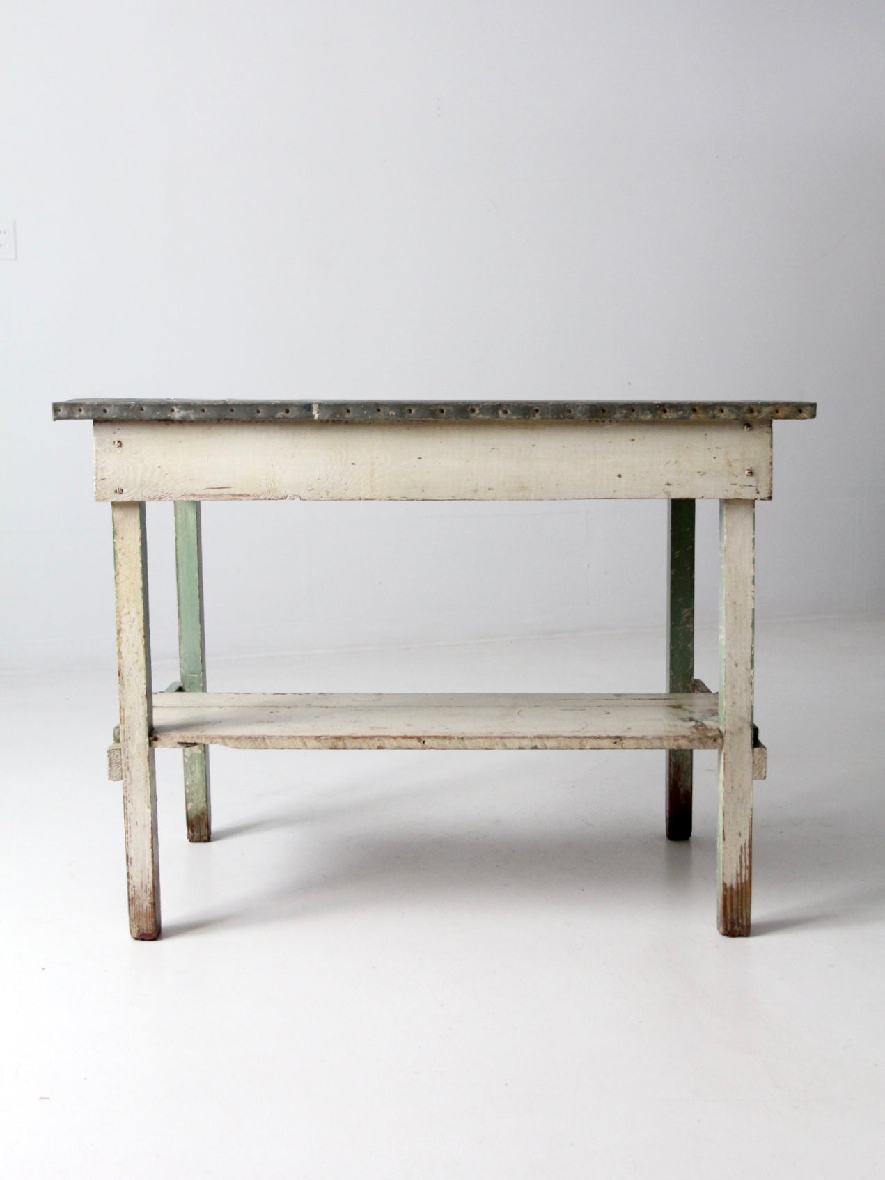 antique table with galvanized top