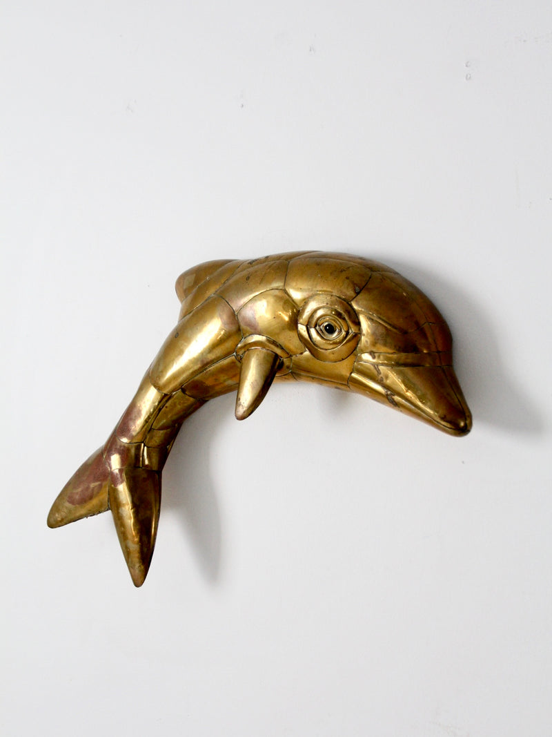 mid-century brass dolphin wall sculpture
