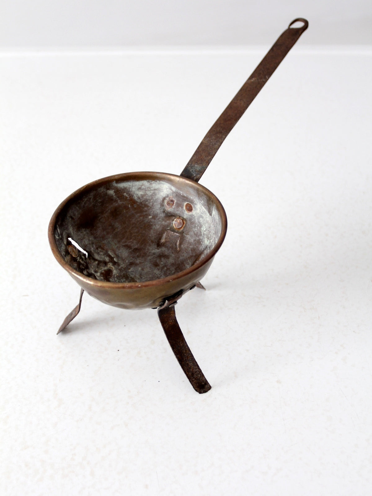 antique footed copper bowl with iron handle