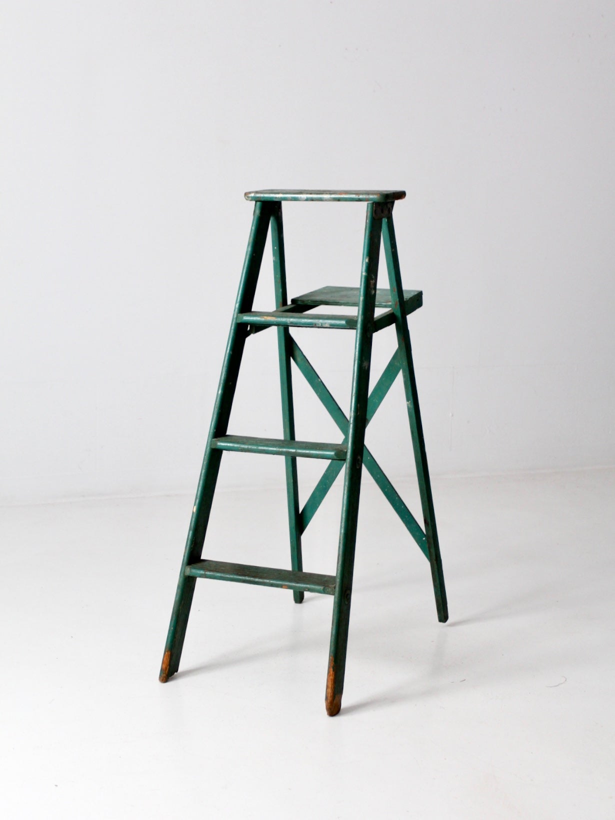 vintage green wood ladder
