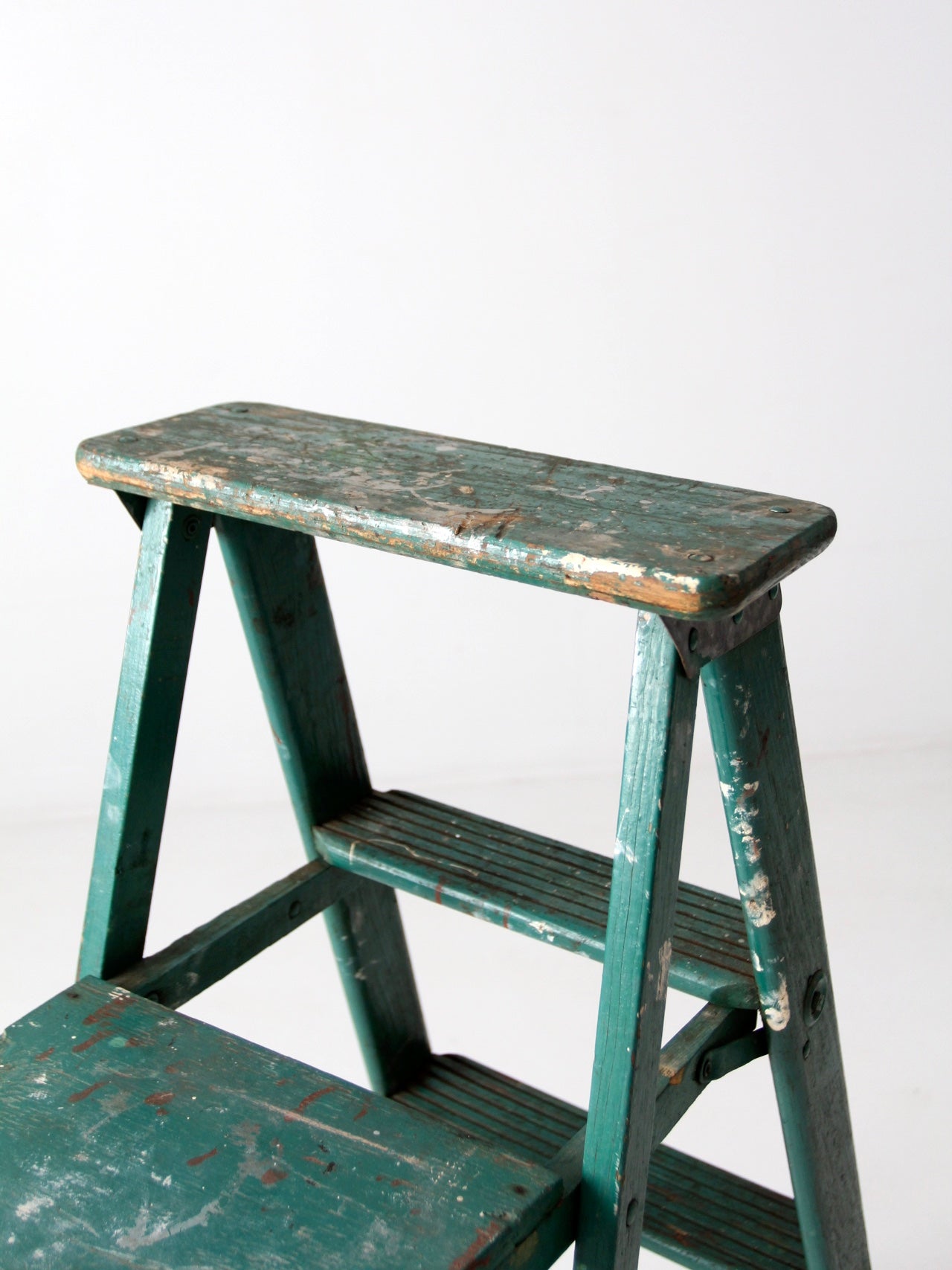 vintage green wood ladder