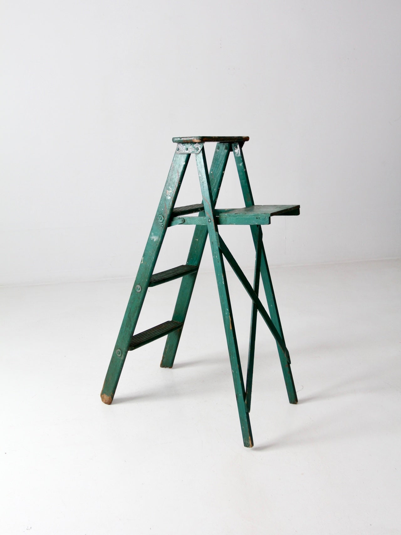 vintage green wood ladder