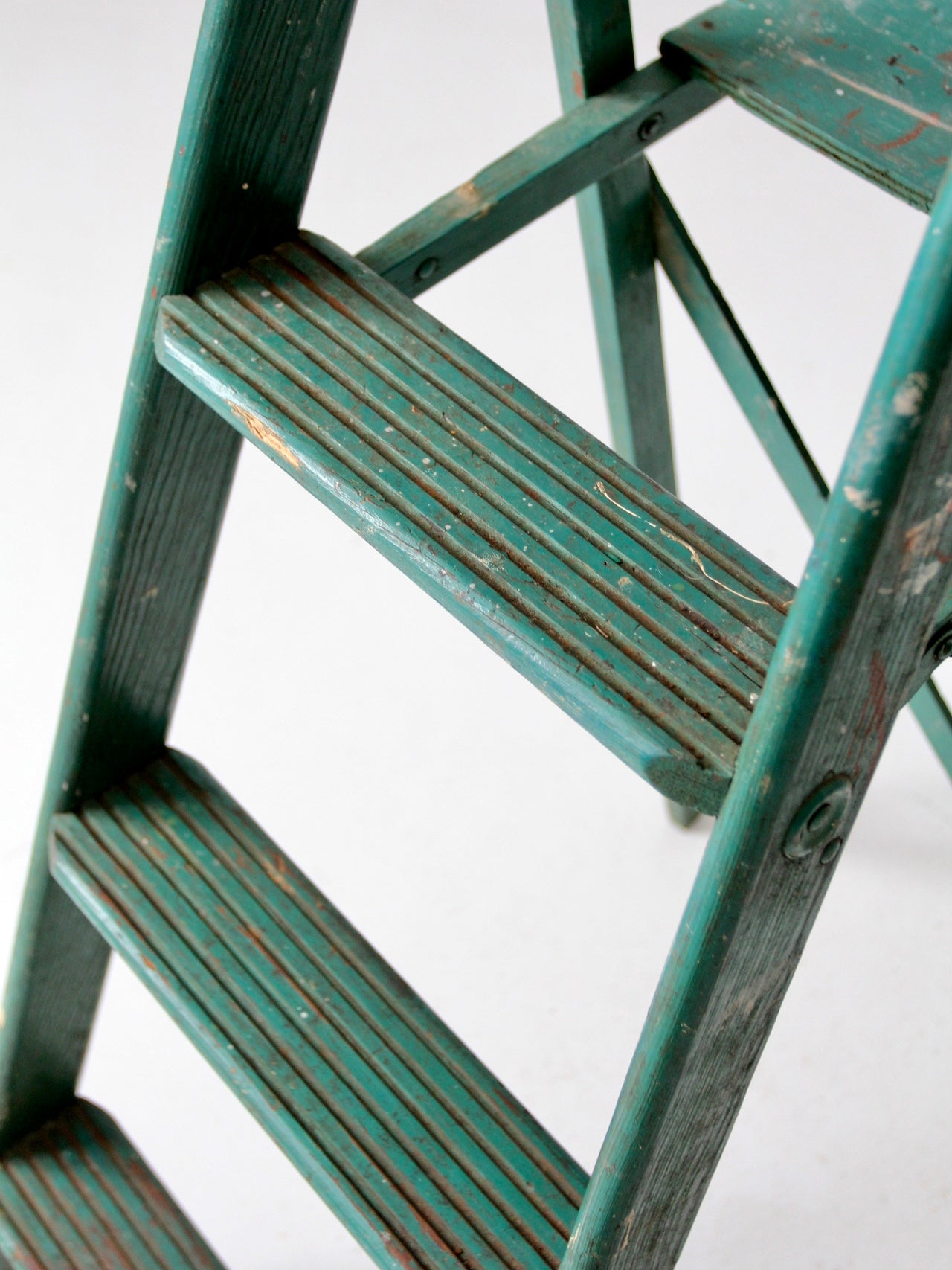 vintage green wood ladder