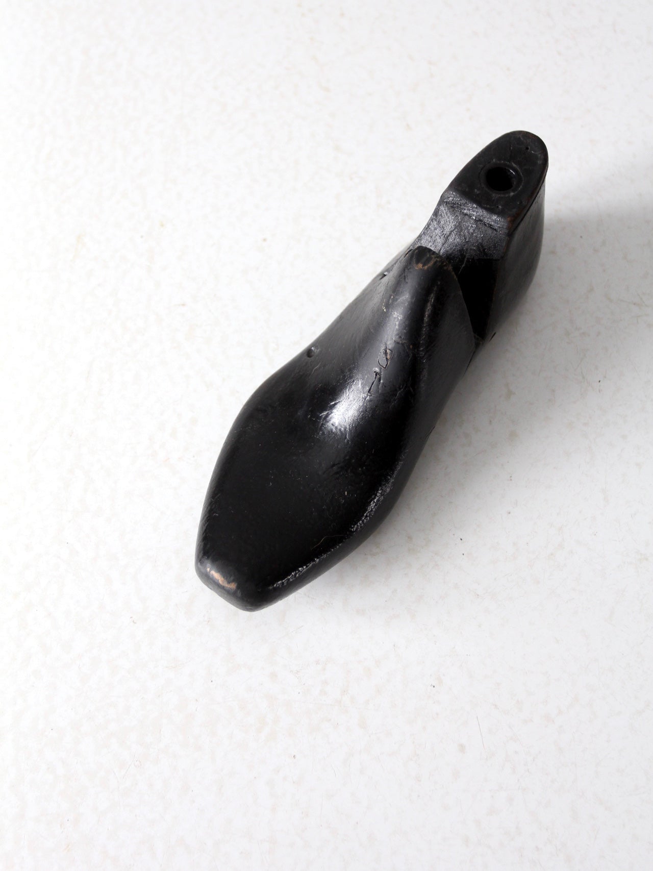 antique black wooden shoe form