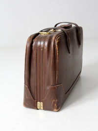 vintage brown leather suitcase