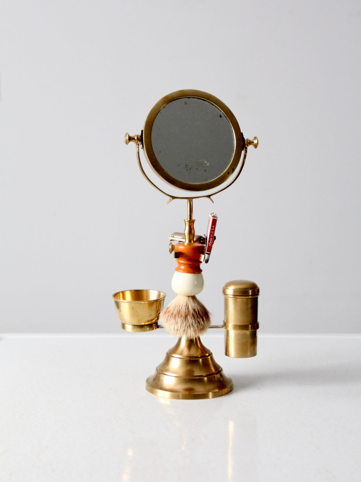 antique brass grooming stand with mirror and Gillette razor