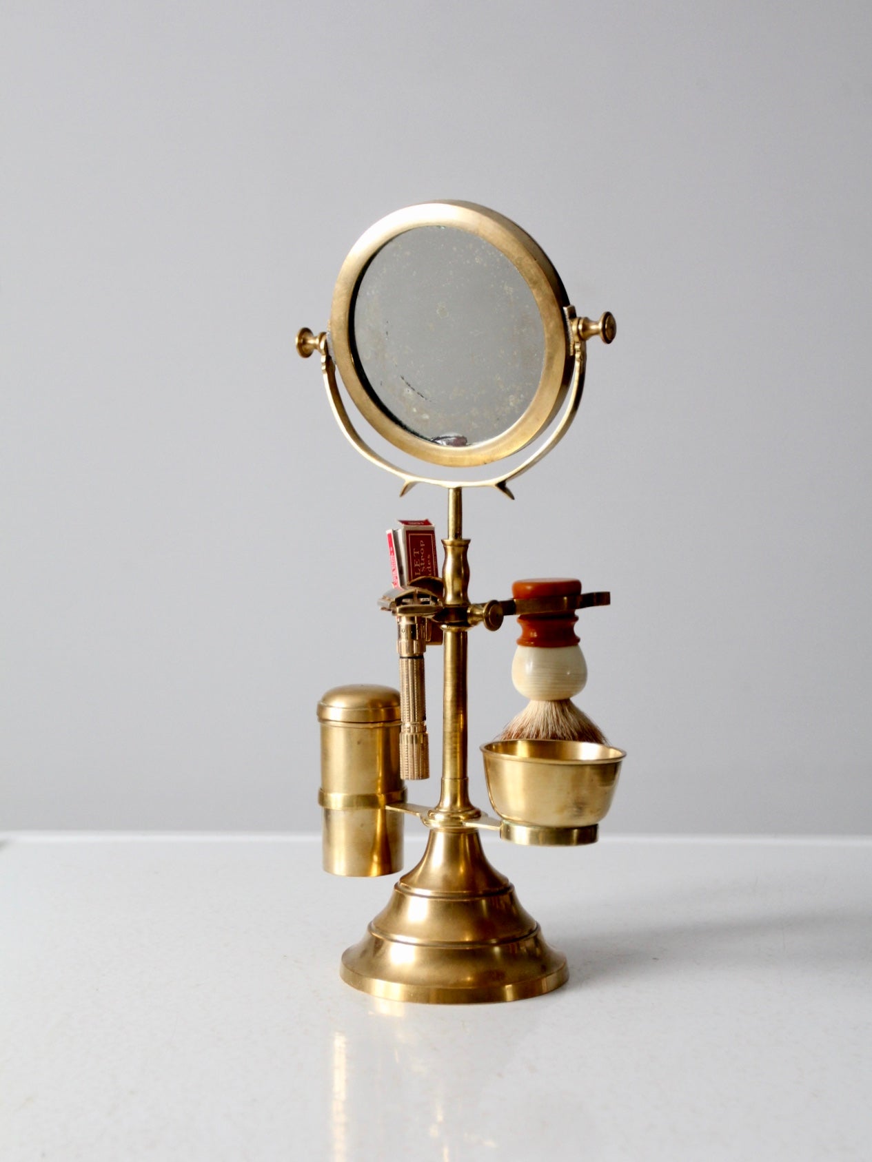 antique brass grooming stand with mirror and Gillette razor