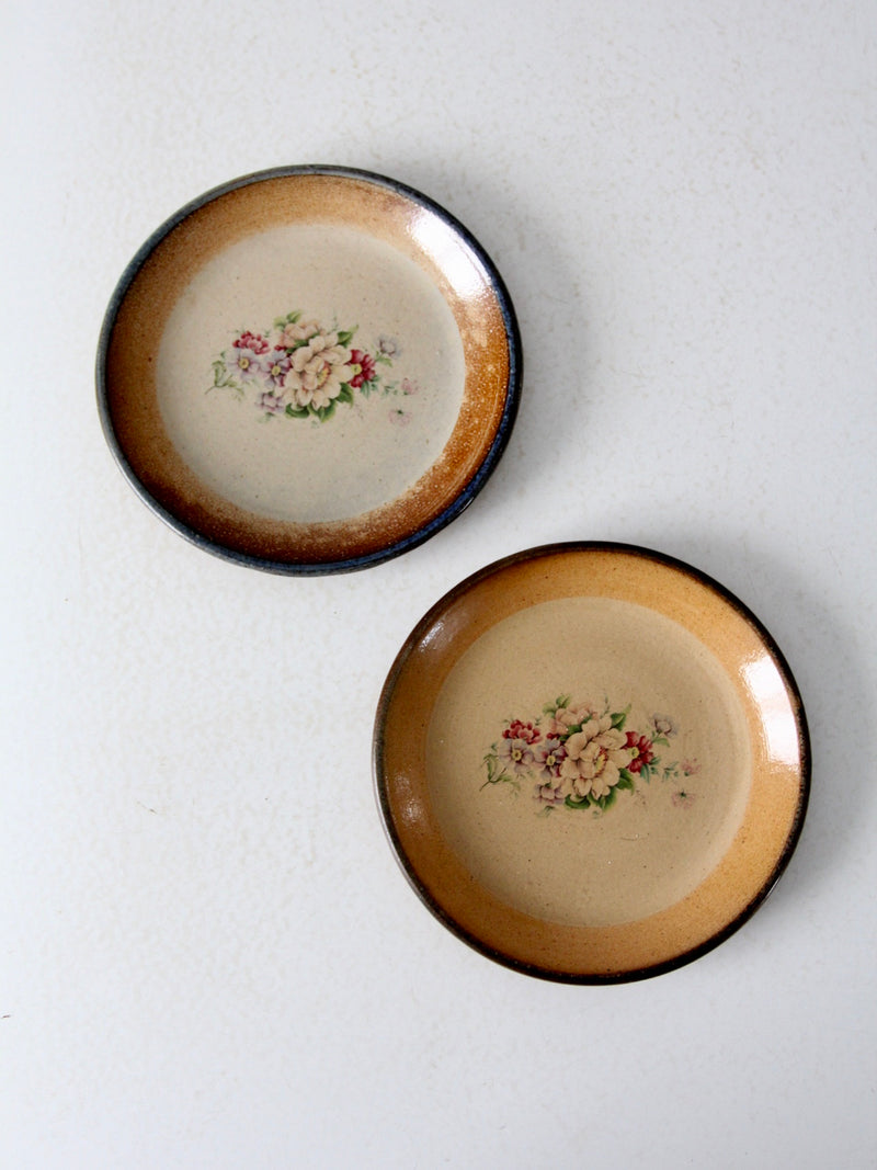 vintage floral pottery plates pair