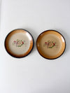 vintage floral pottery plates pair