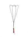 antique rug beater